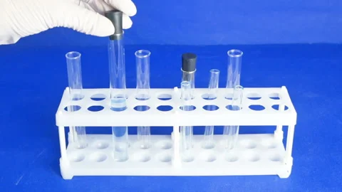 Medical analysis and test doing with tube and reagents Video stock 87261647