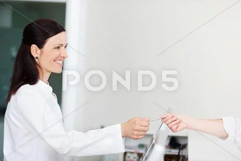 Medical assistant and insurance card Stock Photos