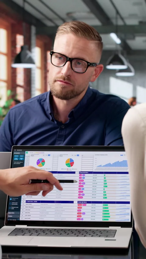 Medical Biller And Coder Analyzing Spreadsheet Data Stock Footage 337630859