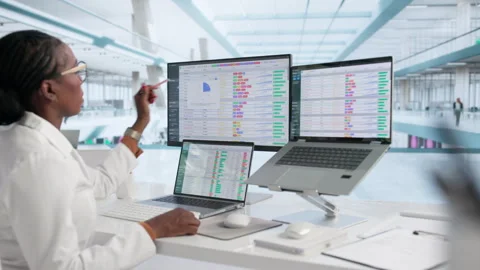 Medical Billing Analyst Working Carefully With Coding Data Stock Footage 338173386