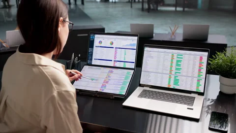 Medical Billing Coder Analyzing Spreadsheets Stock Footage 337640638