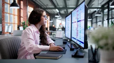 Medical Billing Coder Carefully Analyzes Health Claims Data On Desktop Comput Stock Photos