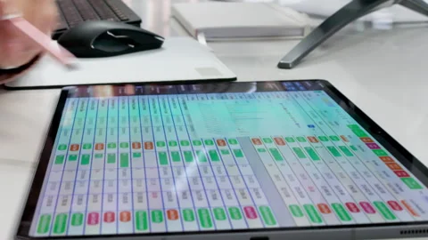 Medical Billing Coder Carefully Reviews Data On Computer Stock Footage 336377608