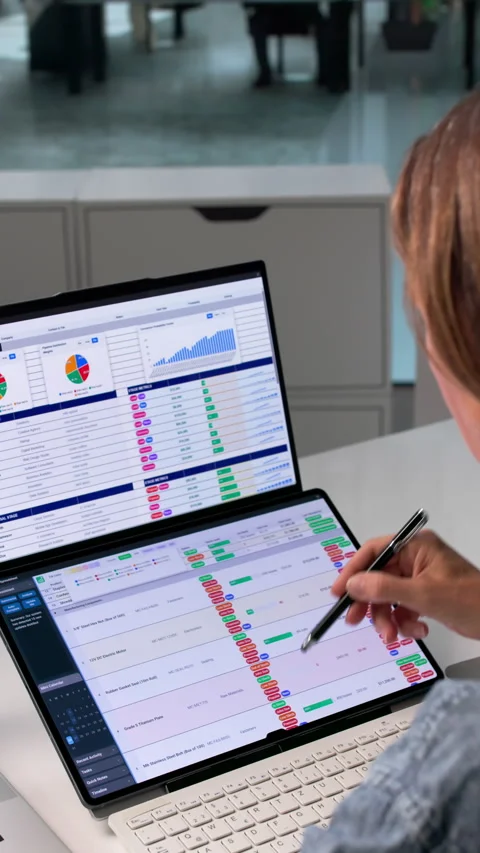 Medical Billing Coder Carefully Reviews Spreadsheet Data Stock Footage 337227870
