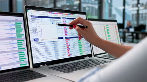 Medical Billing Coder Carefully Reviews Data Stock Footage 339171187
