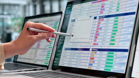 Medical Billing Coder Carefully Reviews Patient Data Stock Footage 339908391
