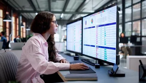 Medical Billing Coder Carefully Reviews Patient Data Using Advanced Software  Stock Photos