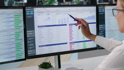 Medical Billing Coder Reviews Data Carefully On Computer Stock-Footage 343880404