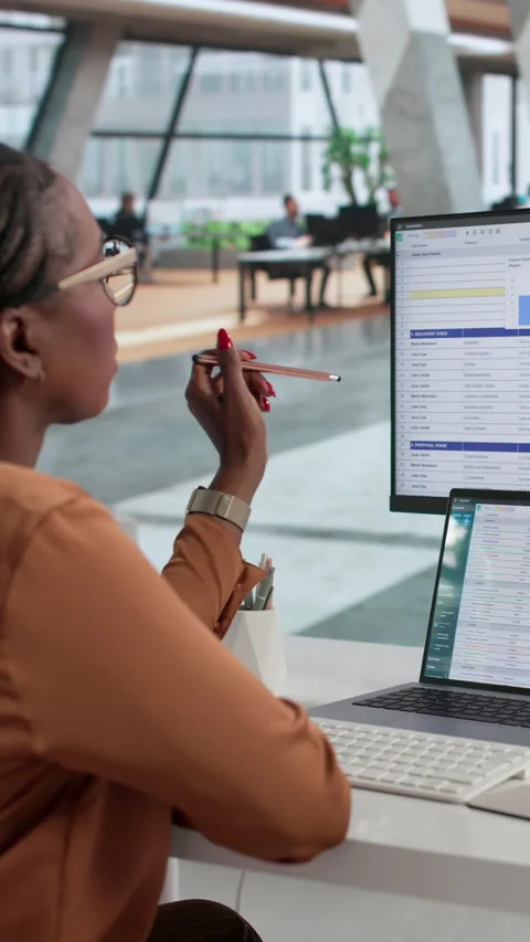Medical Billing Coder Reviews Patient Data On Computer Stock Footage 337646664