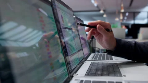 Medical Billing Coder Reviews Spreadsheet Data On Laptop Stock Footage 339887647