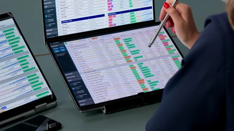 Medical Billing Coder Works Diligently Analyzing Stock Footage 338170502