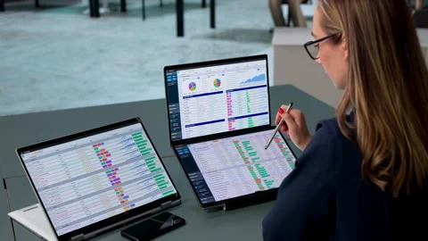 Medical Billing Coder Works Diligently Analyzing Stock Footage 340401879