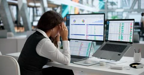 Medical Billing Specialist Struggles With Coding Bills On Laptop Late. Stock Photos