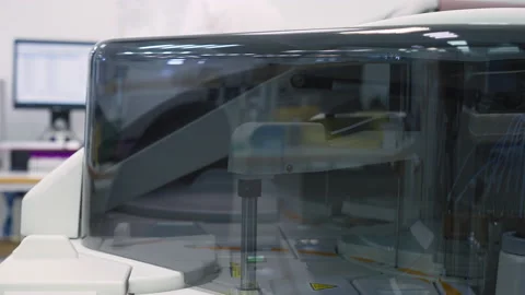Medical Biochemistry Analyzer Machine Inspects Blood Specimens Of Patients Stock Footage 201048383