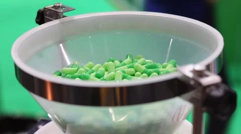 Medical capsules packing process by machine Stock Photos