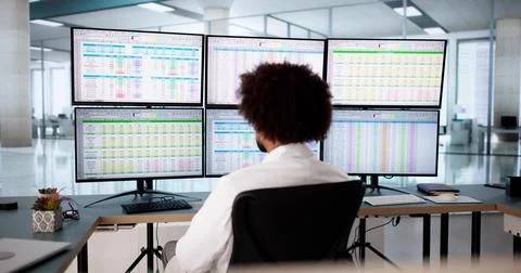 Medical coder analyzes billing codes on hospital computer 写真素材