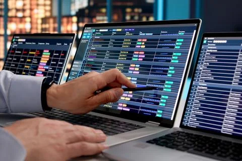 Medical Coder Analyzes Patient Information Meticulously Using Laptop At Offic Photos