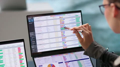 Medical Coder Carefully Inputs Billing Data Video stock 345329719