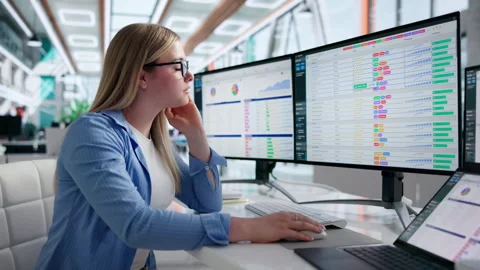 Medical Coder Carefully Reviewing Billing Codes On Computer Screen Video stock 345325324