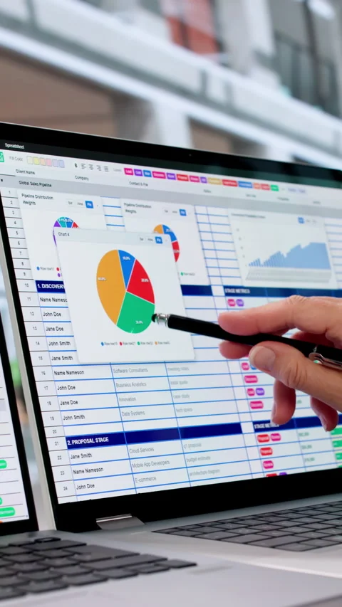 Medical Coder Carefully Reviews Billing Codes On Laptop Stock Footage 337637744