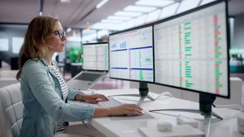 Medical Coder Carefully Reviews Billing Codes On Laptop Stock Footage 340998801