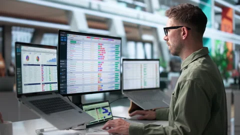 Medical Coder Carefully Reviews Billing Codes On Laptop Stock-Footage 342962696