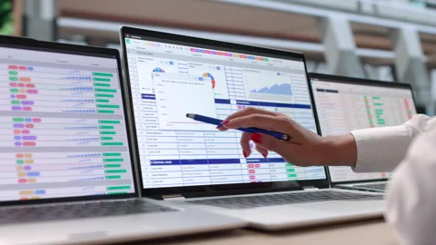 Medical Coder Carefully Reviews Billing Codes On Laptop Stock Footage 342969324