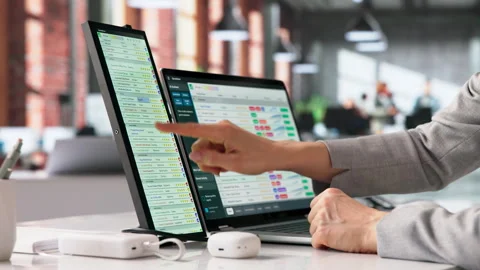 Medical Coder Carefully Reviews Data On Computer Screen Stockbeeldmateriaal 331159755