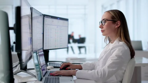 Medical Coder Carefully Reviews Patient Records Stock Footage 339170800