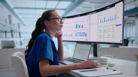 Medical Coder Carefully Reviews Patient Claims On Laptop Video stock 345859074