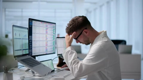 Medical Coder Looks Tired Stock Footage 340398337