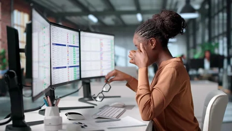 Medical Coder Reviews Billing Codes On Computer Video stock 345314357
