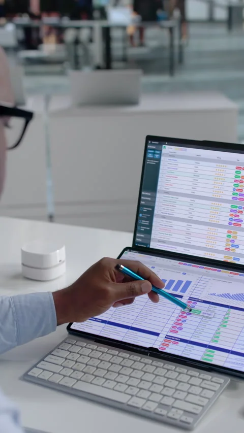 Medical Coder Reviews Billing Data On Laptop Stock Footage 342979447