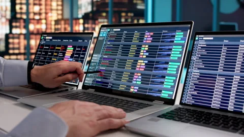Medical Coder Reviews Patient Data Carefully While Working Stock Footage 332499588