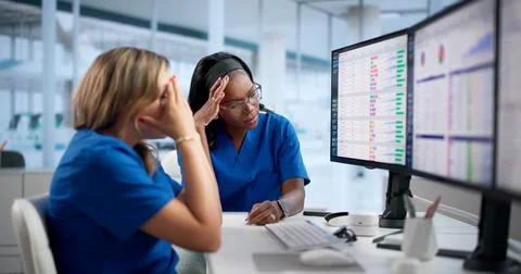 Medical Coder Struggles With Stressful Billing Tasks On Computer Screen Today 库存照片