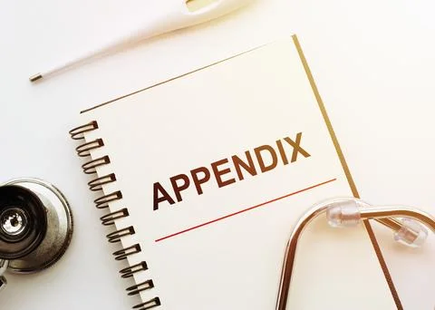 Medical concept. Notebook with word APPENDIX on white desk with stethoscope a Stock Photos
