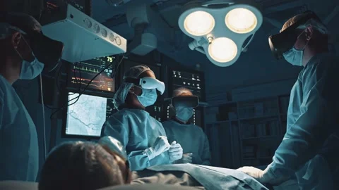 Medical concept. Surgeons using VR headsets medical application simulator for Stock Footage 143678285
