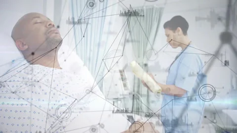 Medical data network animation over patient in hospital bed and nurse reading Stock Footage 303539154
