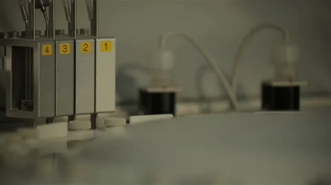 Medical device for sample analysis working in lab, focus out, focus in, close up Stock Footage 52328450