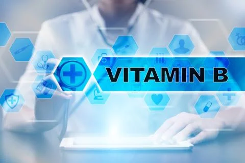Medical doctor using tablet PC with vitamin b medical concept. Stock Illustration