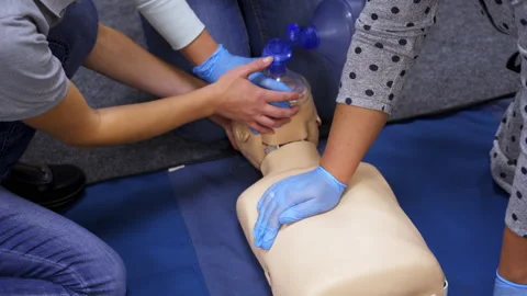 Medical doll for training students. Educational dummy with oxygen mask. Stock Footage 148828601