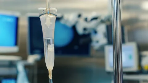 Medical dropper with a solution on a blurred background of surgery 库存影片 229720664