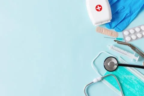 Medical equipments with stethoscope, scissors, syringes and other objects on Stock Photos