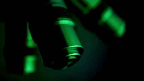 A medical examines the tissue sample under a microscope to identify the virus. Stock Footage 336582645