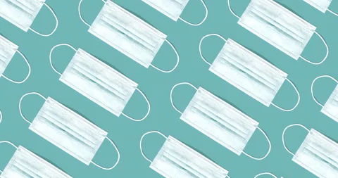 Medical face mask pattern isolated on blue background Video stock 130818914