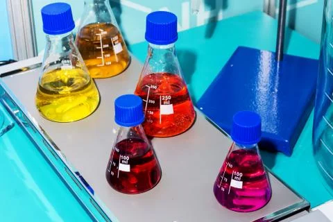 Medical flask on table. Stock Photos