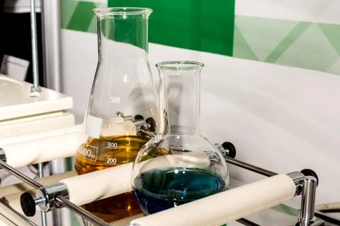 Medical flask on table. Stock Photos