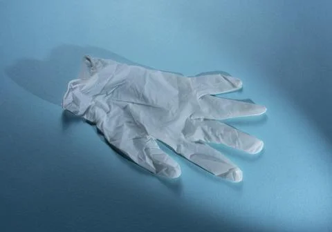 Medical gloves on blue background 写真素材