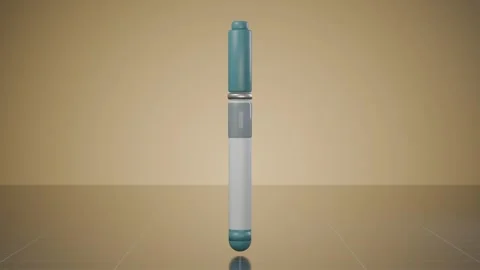 Medical injection pen device rotating warm studio stage loop Stock Footage 342012654