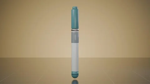 Medical Injection Pen Device Rotating On Warm Studio Stage Stock Footage 342366993